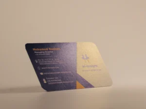 Slanted Ideal ways blue and orange business card reflective light in a white background